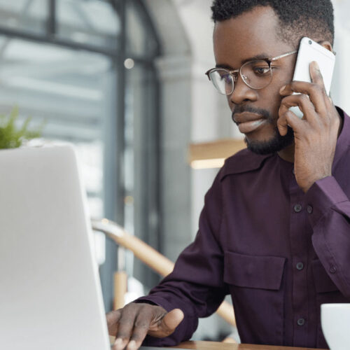 concentrated-dark-skinned-man-formal-wear-looks-confidently-into-laptop-computer-has-serious-expression concentrated-dark-skinned-man-formal-wear-looks-confidently-into-laptop-computer-has-serious-expression