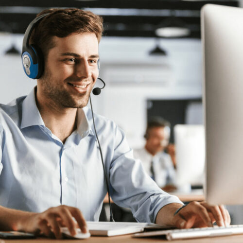 photo-young-worker-man-20s-wearing-office-clothes-headset-smiling-talking-with-clients-call-center photo-young-worker-man-20s-wearing-office-clothes-headset-smiling-talking-with-clients-call-center